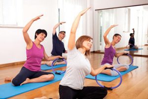 Pilates class using a resistance ring